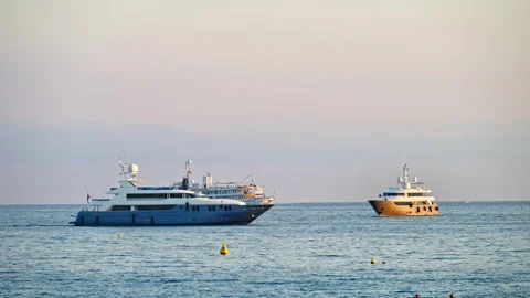 Different types of boats moving on the sea in the evening in Cannes, France Vídeo Stock 297191140
