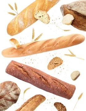 Different types of bread and spikes falling on white background Stock Photos