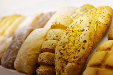 Different types of bread on a bakery display Foto stock