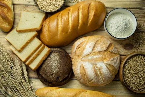 Different types of bread on the table Stock Photos