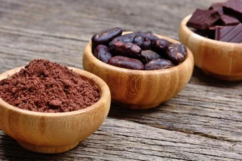 Different types of cacao in a bowls on table Stock Photos