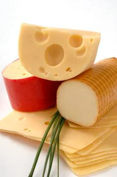 Different types of cheese on a gray background Stock Photos