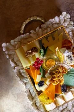 Different types of cheese slicing on the table in a cafe. top view Stock Photos