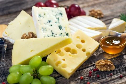 Different types of cheeses varieties Stock Photos
