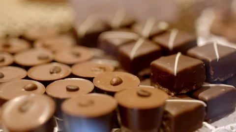 Different types of chocolate in a candy store, close-up shot 스톡 동영상 122619151