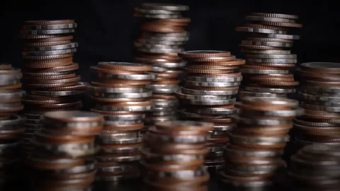 Different types of coins stacked, and business or finance saving money. Stock Footage 169209033