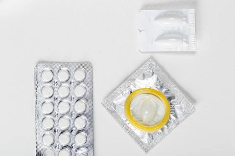 Different types of contraceptives on a white background Stock Photos