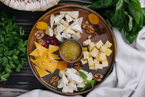Different types of delicious cheese and snacks Stock Photos