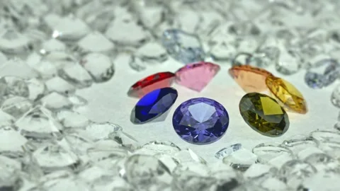 .different types of diamonds displayed in the middle of a white diamonds Stock Footage 252210475