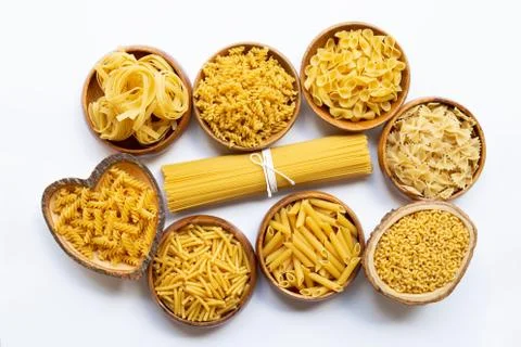 Different types of dry pasta on white. 스톡 사진