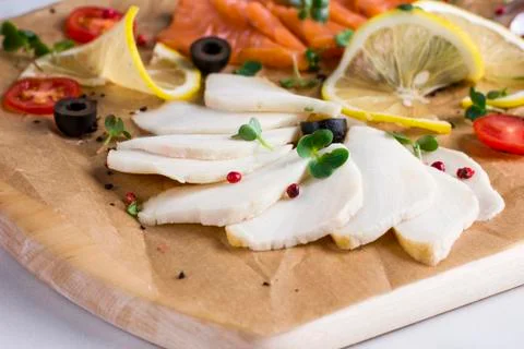 Different types of fish herring, salmon on wooden Board Stock Photos