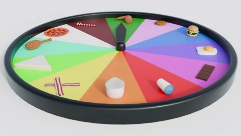 Different types of food are presented as options on a spinning wheel. Stock Footage 320996045