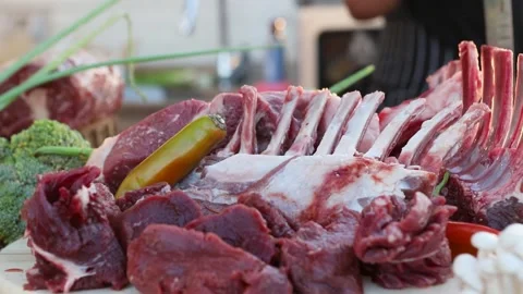 Different types of fresh meat on a tray, ready for grilling on the grill Stock Footage 135625979