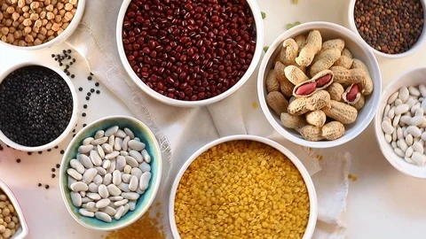 Different types of grains and cereals . View from above Stock Footage 120966959