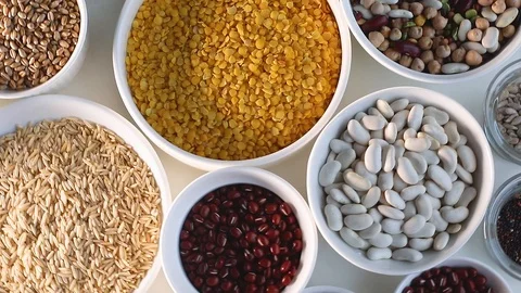 Different types of grains and cereals . View from above Stock Footage 120967027