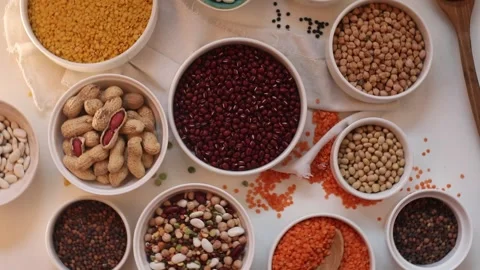 Different types of grains and cereals . View from above Stock Footage 324017896