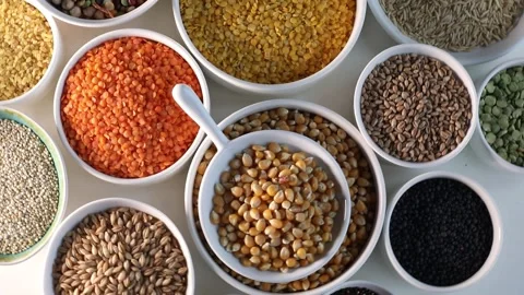 Different types of grains and cereals . View from above Stock Footage 324017974