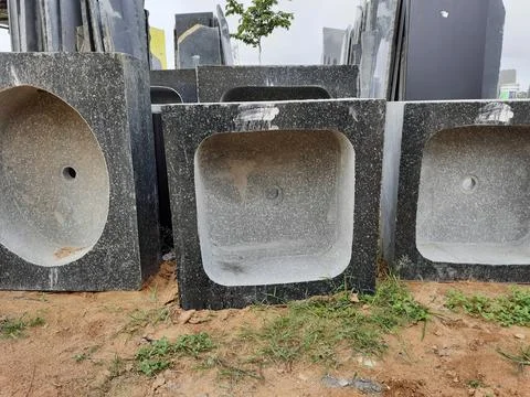 Different types of Granite sinks display in the store front of factory. Stock Photos