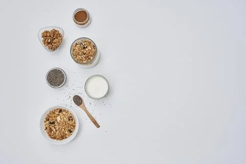 Different types of granola in bowls on a table Stock Photos