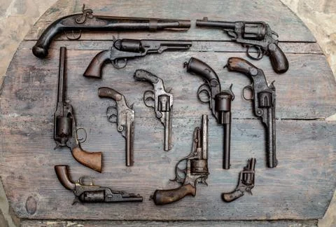 Different types of guns in close up view Stock Photos