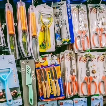 Different types of kitchen knives and scissors Stock Photos