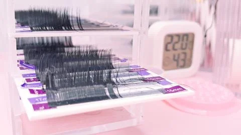 Different types of lashes for classic, volume, and hybrid extensions. Stock Photos