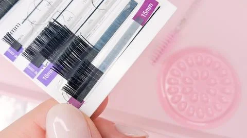 Different types of lashes for classic, volume, and hybrid extensions. Stock Photos