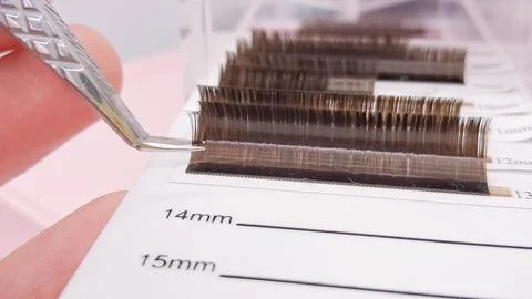 Different types of lashes for classic, volume, and hybrid extensions. Stock Photos