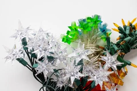 Different types of lights for a Christmas tree on a white background Stock Photos