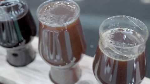 Different types of malt in glasses can be used in bakery, confectionery, brewing Stock Footage 167567515