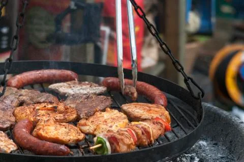 Different types of meat are grilled Stock Photos
