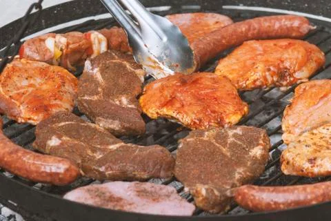 Different types of meat are grilled Stock Photos