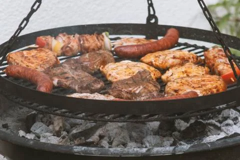 Different types of meat are grilled Stock Photos