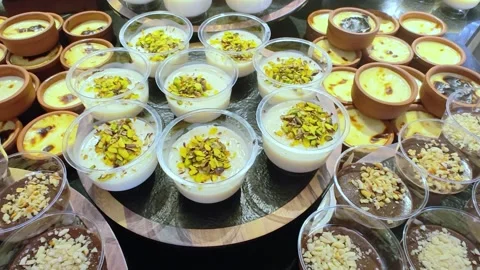 Different types of mousse in transparent cups. Catering set. Stock Footage 316172827