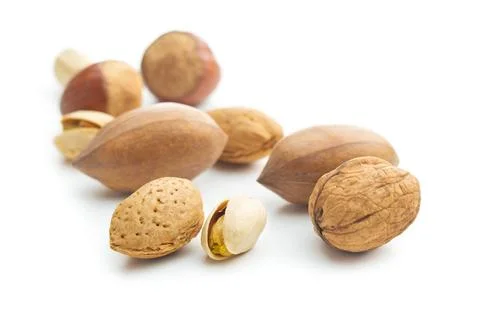 Different types of nuts in the nutshell. Different types of nuts in the nu... Stock Photos
