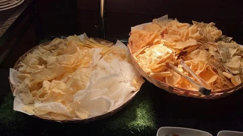 Different types of papad like potato, sabu dana and masala papad served in an Stock Footage 314103011