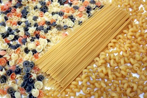 Different types of pasta close up background. Spaghetti and cavatappi. 스톡 사진