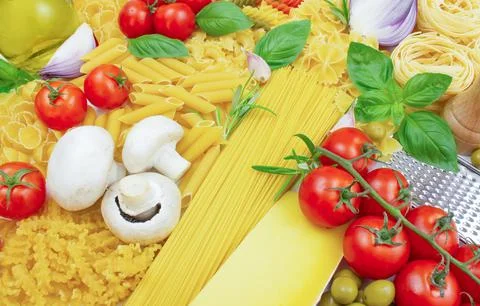 Different types of pasta. Ingredients for making pasta. Stock Photos