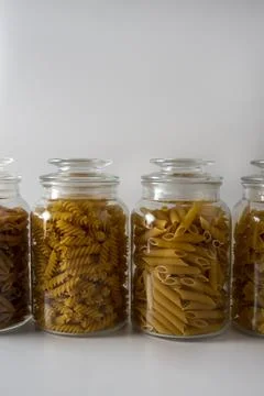 Different types of pasta in a jar Stock Photos