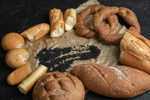Different types of pastries on a parchment paper Stock Photos