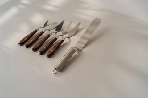 Different types of pastry spatulas cooking utensils for cakes on the table on a Stock Photos