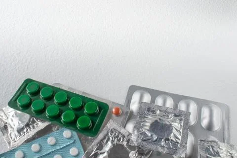 Different types of pills. Tablets in packs. Stock Photos