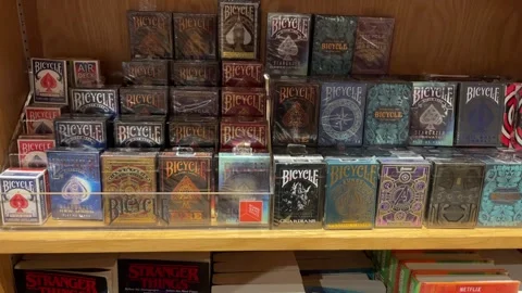 Different types of playing cards in store Stock Footage 241141604