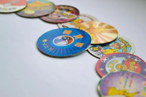 Different types of Pokemon chips that children played with in the 90s Stock Photos