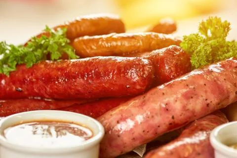 Different types of sausages closeup. Stock Photos