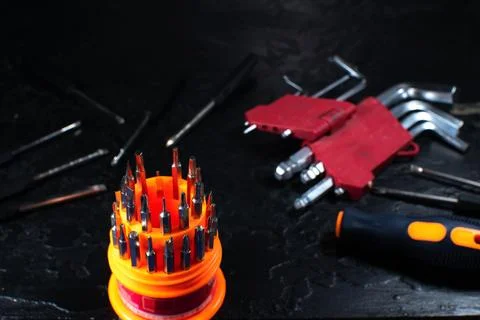 Different types of screwdrivers and hex keys. Working instruments for maint.. Stock Photos
