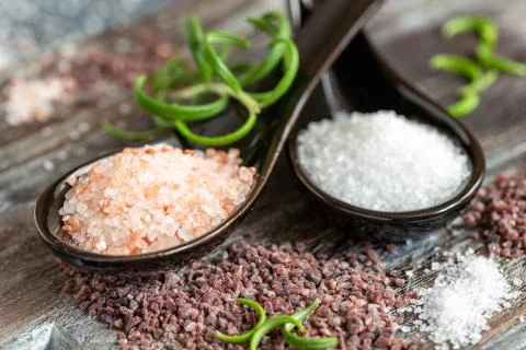 Different types of sea salt close-up. Stock Photos