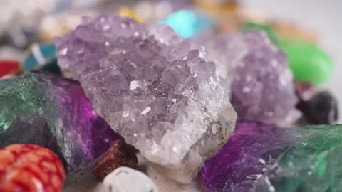 Different types of stones and crystals on a table Stock Footage 336882524