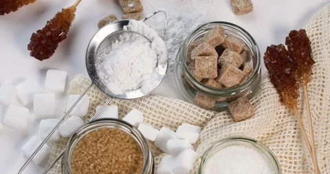 Different types of sugar. Rotate, top view Stock Footage 147591001