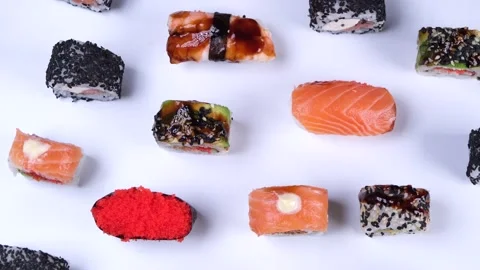 Different types of sushi, rolls with tuna and salmon, Stock Footage 228638517